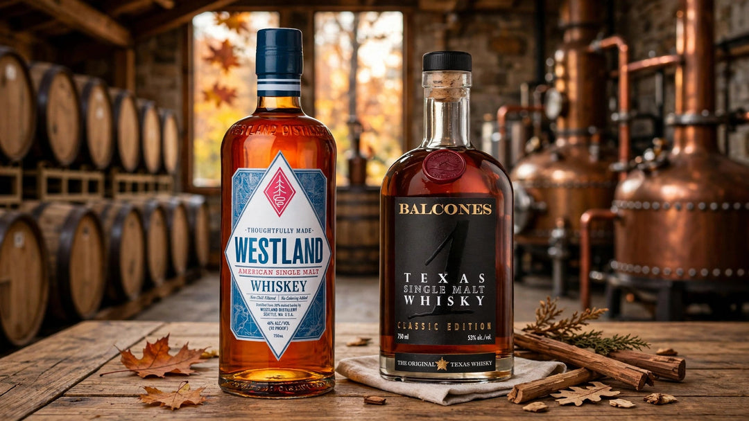 Westland Flagship and Balcones Texas Single Malt whisky bottles with labels readable in a craft distillery with barrels and copper stills at Del Mesa Liquor